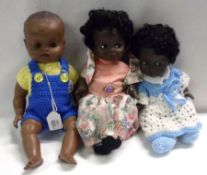 Three mid-20th Century Brown Vinyl Dolls, to include two Palitoy Girls; together with a Chiltern