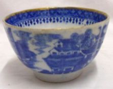 A late 18th/early 19th Century English blue printed Tea Bowl, with gilded rim and the outer body