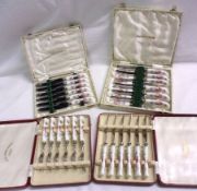 Two Royal Crown Derby Cased Sets, comprising six curved Knives and six Cake Forks; a further set