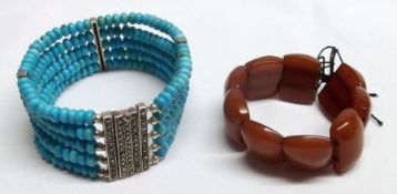 A Five Strand Turquoise Bead Bracelet with Marcasite mounted clasp (minor defect); together with