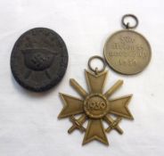 Third Reich 1939 War Merit Cross 2nd Class with Swords; together with Black Wound Badge and German