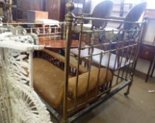 An early 20th Century Brass Double Bedstead, the head and footboard inset with mother-of-pearl