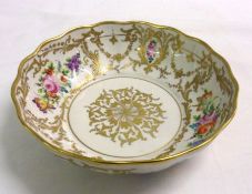 A Paris Porcelain Circular Bowl, painted in colours with floral sprays and garlands with gilded