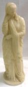 An Alabaster Figure of a Madonna, 17 ½” high