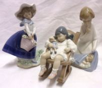 Three Lladro Models of young girl with a basket of flowers; a winged putto with a sleeping child;