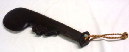 A 20th Century Maori Hardwood Ceremonial Club, inset with small mother-of-pearl mounts and detail,