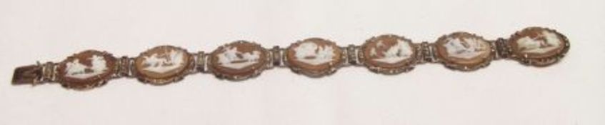 A white metal framed Cameo Panelled Bracelet depicting Classical Figures, approximately 19cm long
