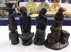 A Mixed Lot comprising: a pair of Zambian black finished Pottery Models of Musicians; together