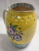 A Royal Bradwell Jug decorated with a floral design, 8” high