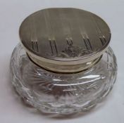 An Elizabeth II Silver Lidded and Clear Glass Powder Bowl, of compressed circular form with star-cut