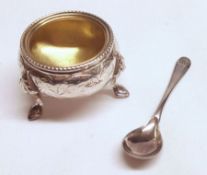 A Victorian Single Cauldron Salt, with beaded rim, engraved body and crested cartouche, raised on