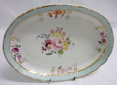 A 19th Century English oval Dish, the centre painted in colours with a floral spray within a similar