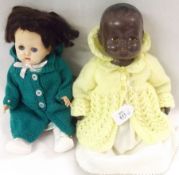 Two mid-20th Century Composition Rosebud Dolls, one white with weighted blue sleep glass eyes,