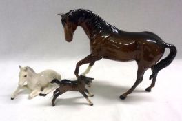 A Royal Doulton Model of a horse (Beswick Title Spirit of Youth No 2703); a further Royal Doulton