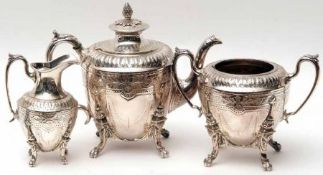 An early 20th Century three piece Tea Set comprising:  Tea Pot, Sugar Basin and Milk Jug, each