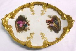 A Berlin KPM two-handled oval Platter, painted in colours with panels of romantic scenes within a