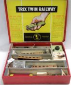 A Trix Twin Railway Set, to include small green liveried Tank Locomotive and LNER Tender; three