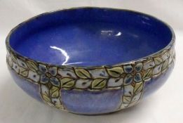 A Royal Doulton Stoneware Bowl of shaped circular form, incised and moulded with foliate borders and