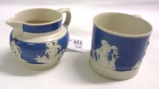 A 19th Century Jasperware compressed small Milk Jug and matching small Circular Tankard (2)