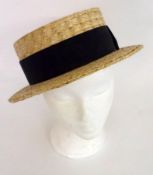 A Straw Boater with interior label The York Hat, size 7 ¾