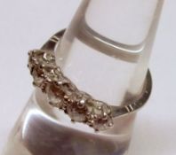 A unmarked precious metal five old cut Diamond Ring, claw set, approximately .8ct total