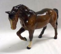 A Beswick Model of a stocky jogging mare, (3rd version, No 1090, brown finish), 6” high