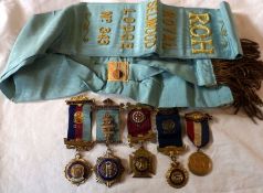 A Packet containing Masonic Sash, Royal Selwood Lodge No 343 + five Masonic Jewels including two