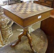 A 19th Century Mahogany Games Table, the top with chequerboard inset and inlaid border, lifting
