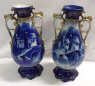 A pair of English Pottery two-handled Vases of tulip baluster form, each printed in blue with