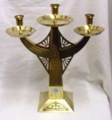 An unusual early 20th Century Lacquered Brass Three Light Candelabra, with plain sconces over shaped