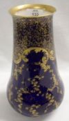 A Doulton Burslem Decorative Vase, gilded with scrolls and twining sprays of foliage on a dark