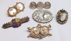 A packet containing six various Victorian Jubilee Brooches, including an oval hallmarked Silver