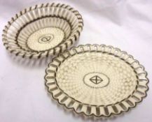 A Wedgwood Creamware oval basket-formed Dish on Stand, decorated with bronze coloured detail on a