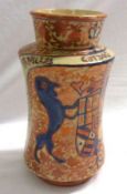 A Lustre Ware Vase of waisted cylindrical form, decorated with an armorial and inscription, circa