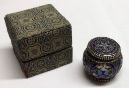 A 20th Century Oriental white metal and enamelled Pill Box, of compressed circular form with