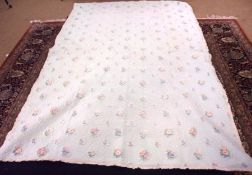 A 1920s French Large Quilted Bedspread, blue ground decorated with small flowers