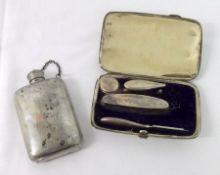 A Mixed Lot comprising: a base metal Spirit Flask of typical form; together with a cased Manicure