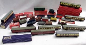 A quantity of Hornby Dublo Carriages and Goods Wagons, some retaining original boxes, to include