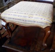 A Walnut Stool of Square Form, with Regency stripe upholstered seat, raised on cabriole supports