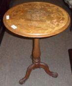 A 19th Century Circular Pedestal Table, the marquetry inlaid top decorated with flowers and