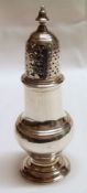 A George II Pepper Caster, of baluster form with pierced and engraved pull-off cover with cast and