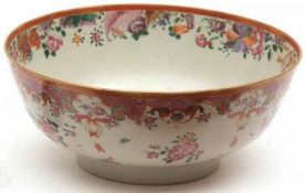 An 18th Century Chinese Circular Bowl, the outer body painted in famille verte and rose with central