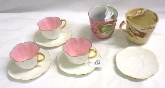 A set of three Shelley “Dainty” shaped Cups and four matching Saucers, decorated in plain white; a
