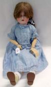 A Schoenau & Hoffmeister Bisque Headed Character Doll, with blue weighted sleep glass eyes with