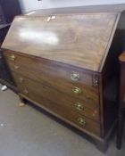 A Large Mahogany Bureau, the crossbanded and boxwood strung fall front enclosing a fitted interior
