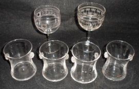 A set of four Whitefriars Glass small clear Vases of waisted form, moulded on either side with