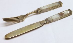 Two pairs of former Austro Hungarian Silver Gilt and Mother-of-Pearl Dessert Knives and Forks,