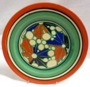 A Clarice Cliff Circular Plate, decorated with the “Broth” design, within a red, black and green