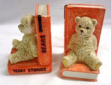 A pair of Nursery Ware Bookends, each modelled as teddy bears reclining on books, and inscribed “