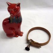 A Poole Pottery Delphis Ware Model of a seated cat, decorated predominantly in red; together with